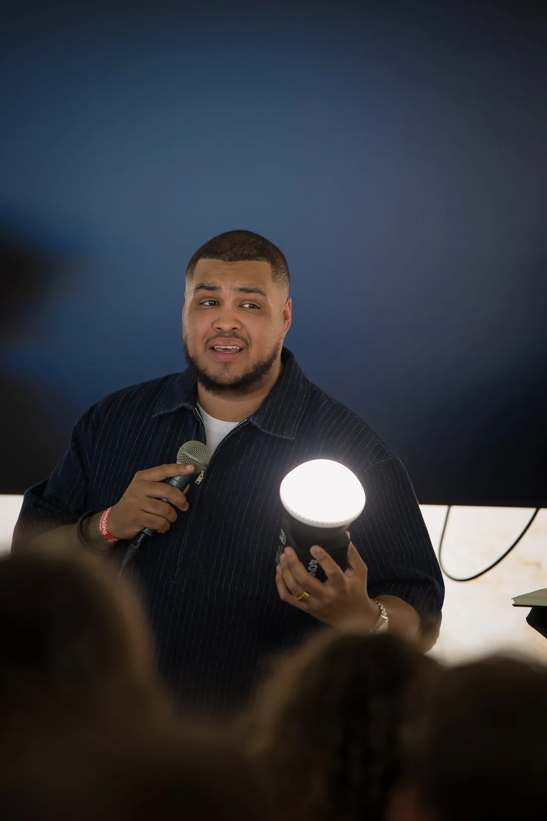Jefren Mesa teaching with a microphone